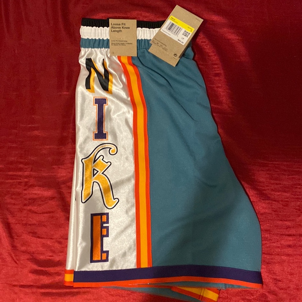 nike shorts loose fit above knee length